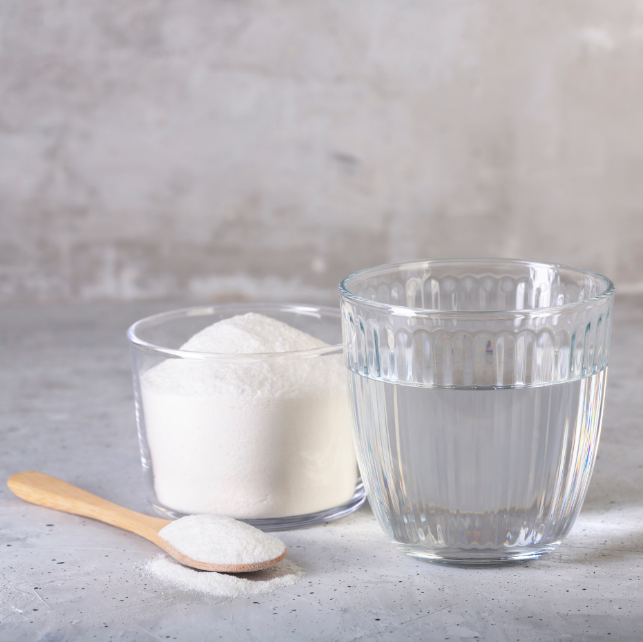 mBIOTA Elemental's Diet Powder mixed in a glass of water - a superior tasting solution compared to competitors